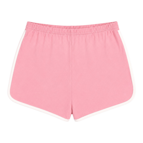 Front view of INTROVERT women's retro track shorts in pink featuring a comfortable elastic waistband and contrast white piping along the curved edges.