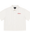 Front view of INTRV Clubhouse Pinstripe short sleeve shirt in off-white featuring a relaxed boxy cut, matching tonal buttons, and contrast red cursive embroidery on the left chest.