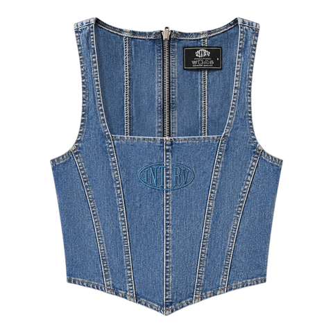 Front view of INTRV women's vintage blue washed denim corset top featuring a square neckline, panel tailoring, a dipped pointed hem, and tonal blue oval logo embroidery on the center chest.