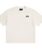 Front view of INTROVERT unisex oversized short sleeve t-shirt in off-white featuring a clean crewneck collar and a small wavy black INTRV logo on the left chest.